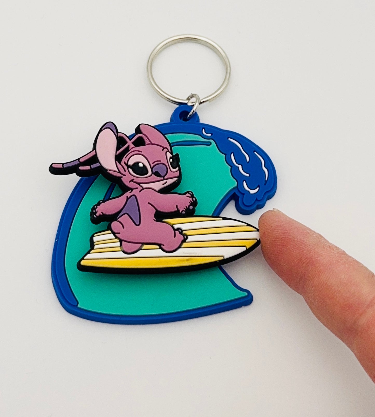 Disney – Angel Surf – Porte-clés 3D “Spinner” officiel