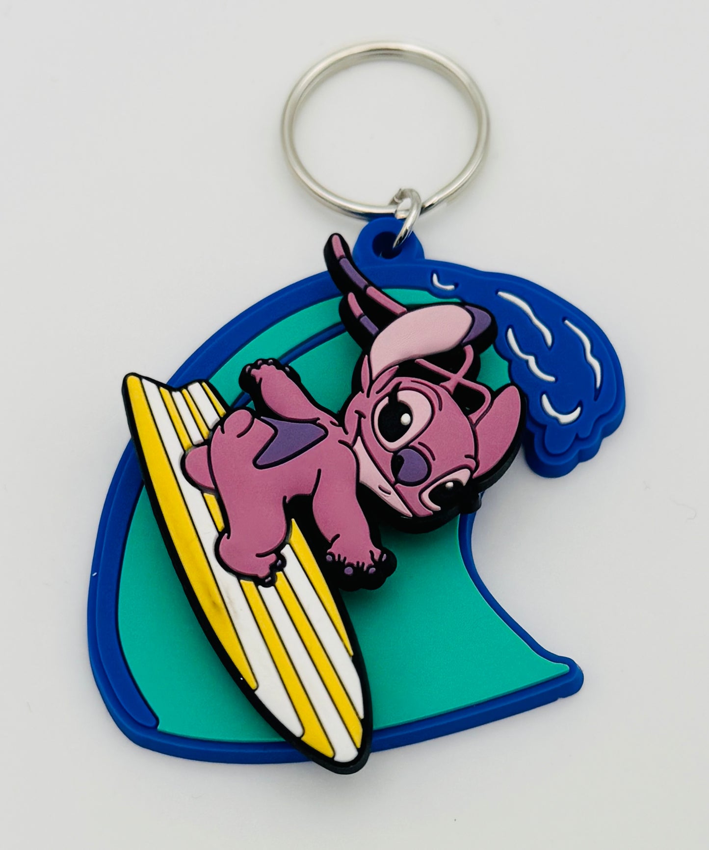 Disney – Angel Surf – Porte-clés 3D “Spinner” officiel